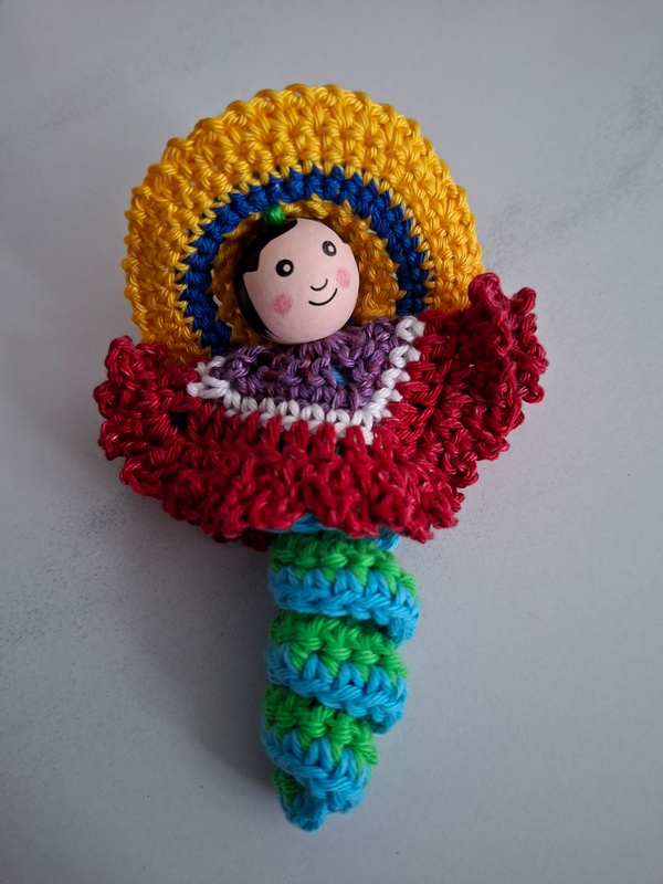 De Overburen, kleurig Mexicaans poppetje met sombrero en poncho